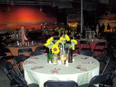 The main dining area was draped with sunset backdrops and featured bouquets of sunflowers on each table.