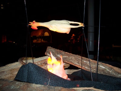 A rubber chicken roasting over a campfire was one of the centerpieces in the dining room.