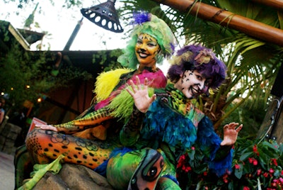 Street performers in brightly colored costumes entertained guests as they mingled throughout the attractions.