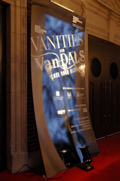 Large reflective signs for the event included the names of sponsors and the theme.