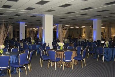 Blue covered the event's main space, from the chairs and linens to the accent lighting.