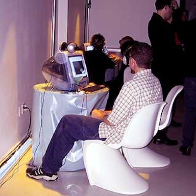 Guests could check out the Absolutdirector.com Web site on computers set up throughout the space with mod-looking white furniture.