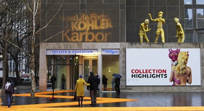 An orange carpet and a Kohler gobo marked the entrance to the event.