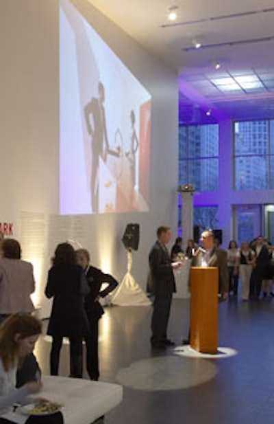 Projection screens showed images of the new faucet's design.
