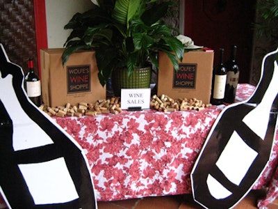 Wolfe's Wine Shop, an event sponsor, used corkscrews as a decorative accent at its display.