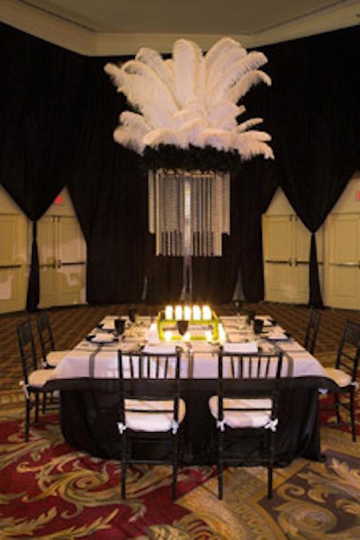 Some tables showcased five-foot-tall centerpieces topped with overflowing white feathers.