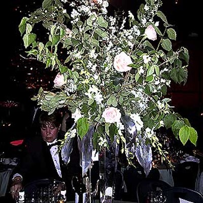 Tall flower arrangements added height and variety to the room.