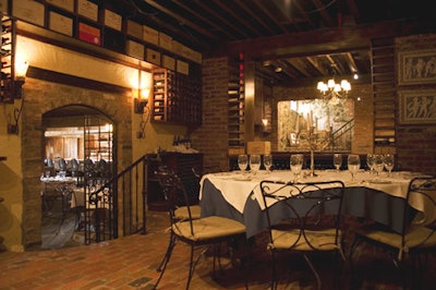 The 16-seat chef's table at Mrs. K's Wine Press space is semiprivate, sectioned off by glass.