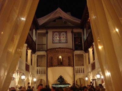 The entryway into the courtyard was draped with sheer linens.