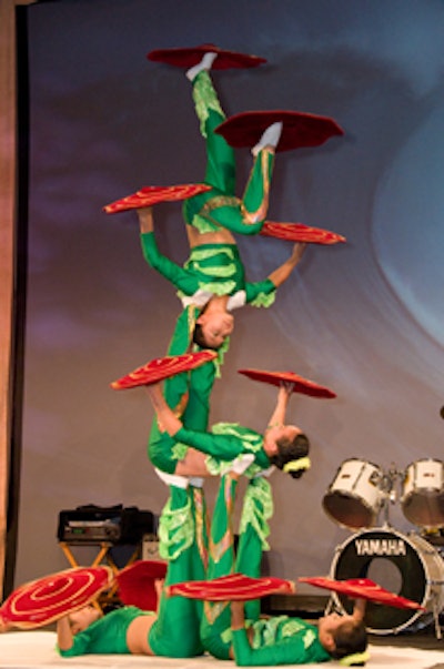 Chinese rug twirlers performed acrobatic stunts during dinner.