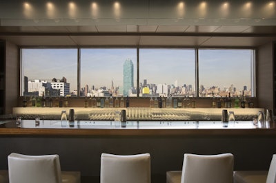 On CityView's second floor, a 40-foot-long bar overlooks Manhattan.