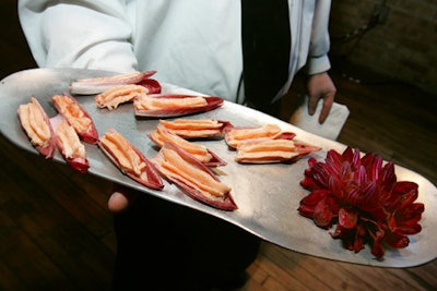 Passed hors d'oeuvres from J&L Catering included salmon mousse served in endive petals with lemon zest.