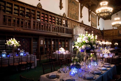 Spotlights lit the four-foot-tall centerpieces in the old reading room, and blue L.E.D. lights lit the tables.
