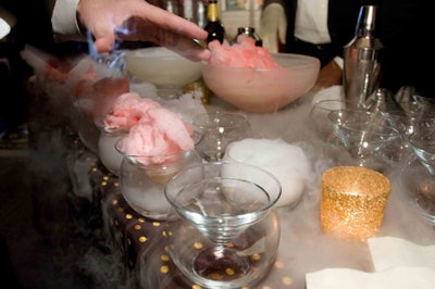 The night's Mystical Colada included a hunk of cotton candy (which dissolved with the addition of rum), displayed on globes filled with dry ice.