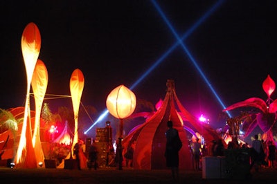Laser-like beams of white light around the perimeter lit up the festival grounds when the sun went down.
