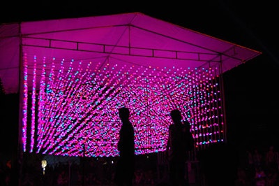 A light installation on the field popped at night.