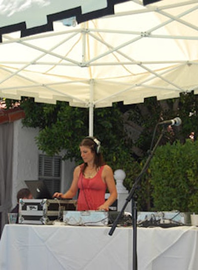 DJ Pesce spun dance tunes at GQ's poolside party on Sunday.