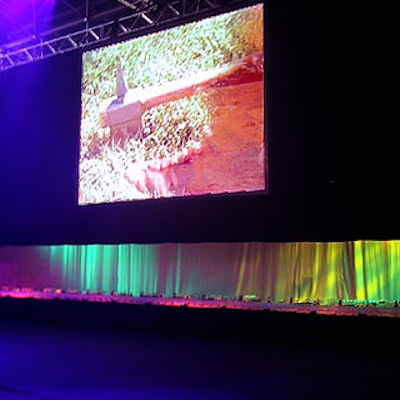 Above bars at both sides of the room, screens showed clips from various Robin Hood movies.