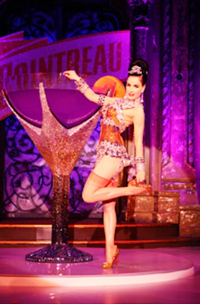 Dita Von Teese performed her new burlesque act on a revolving stage that featured a giant martini glass.