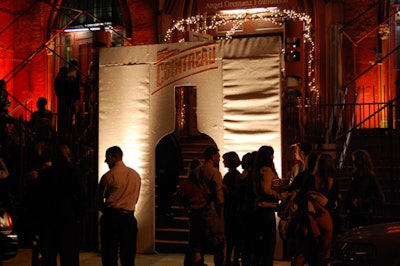 A bottle-shaped cutout marked the entrance to the event.