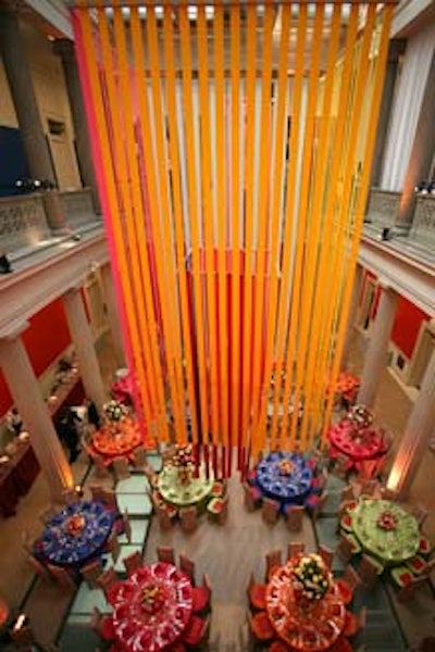 The Corcoran's atrium, the ball's largest dining space, took on colors of spring, with hanging chandeliers made of layered sashes.