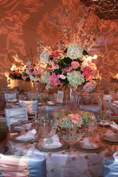 Gallery 25, also known as the Tutu Room, matched pink tones and frilly settings with four-foot-tall arrangements of Asiatic lilies, hydrangea, and cherry-blossom branches in glass cylinders.
