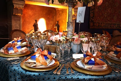 Members of the women's committee added personal touches to their own tables, such as copper bow-tied gifts in the Mantle Room.