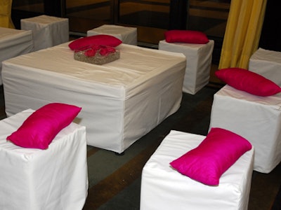 Pink pillows accented the lounge seating throughout the Kennedy Center space.