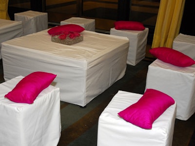 Pink pillows accented the lounge seating throughout the Kennedy Center space.