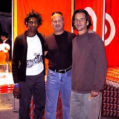 Larzell Cowan, Rand Burrus and David Steinberg of Rand. M Productions posed in front of their colorful Target display.
