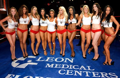 The participants in the 'Hottest Ring Girl' competition posed together in the center of the ring.