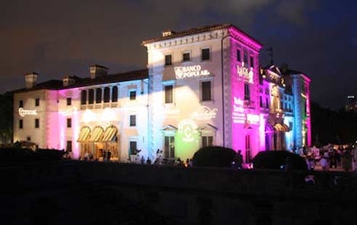 Sponsors' logos were projected onto the exterior walls of the mansion.