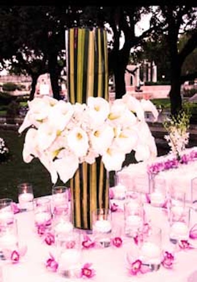 A delicate color palette was used throughout the courtyard spaces featuring pink orchids, calla lilies, and bamboo centerpieces.