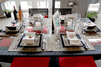 For the Father's Day display, Sebastien Centner of Eatertainment created a more formal setting, dressing the glass-topped Cabana table with square dinnerware and acrylic wine glasses.