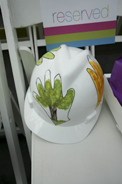 The V.I.P.s selected to dig at the groundbreaking received customized hard hats bearing the Children's Memorial Hospital logo.
