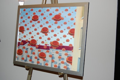 The exhibit featured a painting of floating burgers with the McDonald's logo in the background.