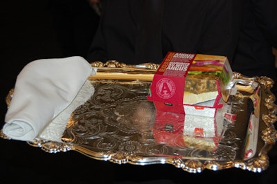 Servers passed the new Angus burger on silver trays with cloth napkins.
