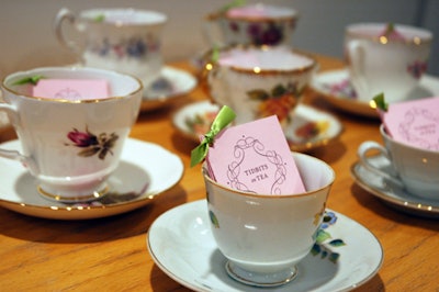 For a table at this year's New York Horticultural Society gala, the team created favors out of vintage tea cups filled with a package of flowering tea and a booklet called Tidbits on Tea.