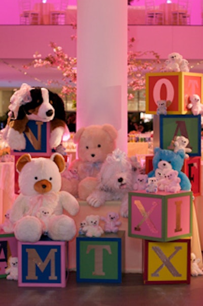 A display of large alphabet blocks and teddy bears stood at the 54th Street entrance.