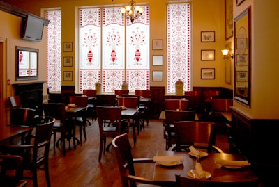 Etched-glass walls are a focal point at the back of the restaurant, which is attached to the Irish Embassy.