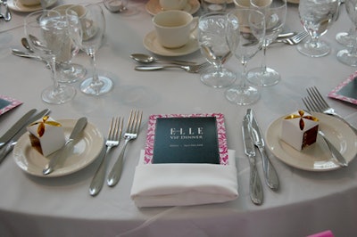 Menu cards marked each place setting at the V.I.P. dinner in the lobby of the Direct Energy Centre.