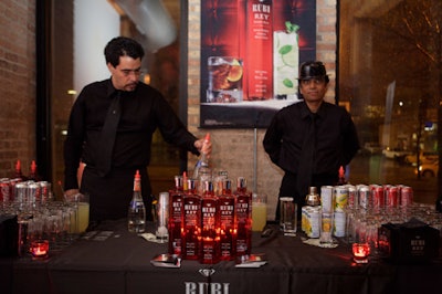 Bartenders poured cocktails made with Rubi Rey Rum—another party sponsor.