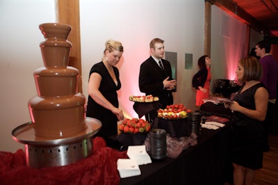 Guests could dip fruits and sweets into the chocolate fountain, provided by the Melting Pot.
