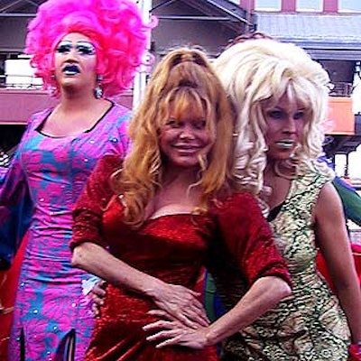 Charo (center) served as hostess for Alize's Cruise to Passion event and posed with drag queens including Screaming Queens' Miss Understood (left).