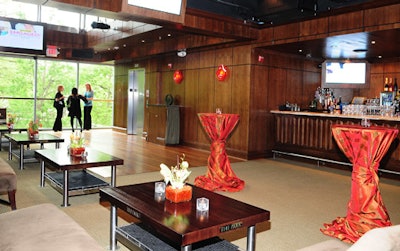 The People party dressed up the Park's modern space with small orchid arrangements and standing tables wrapped in red-and-brown-striped linens.