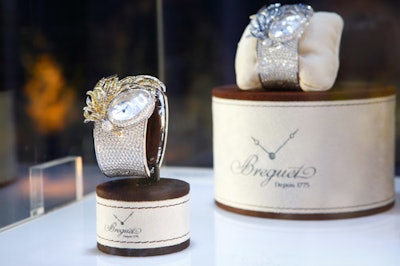 Breguet displayed jewels and watches in cases.