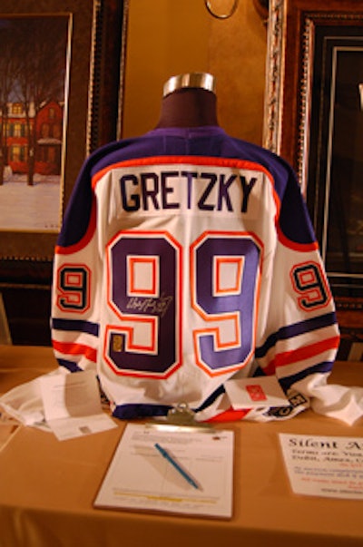 Silent-auction items included a hockey jersey signed by Wayne Gretzky.