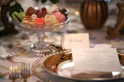 Each table held crystal dishes filled with pastel-hued petit fours.