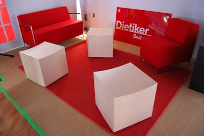 The furniture company Dietiker Switzerland created a red lounge space and provided extra seating.
