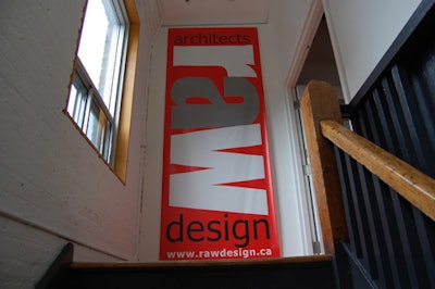 Posters directed guests to the Raw Design office, located on the top floor of a loft-style building.